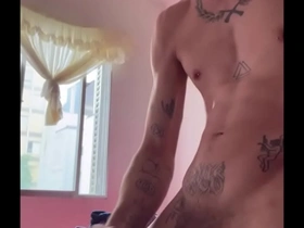 Young gay guy shows off his body and gets an orgasm.