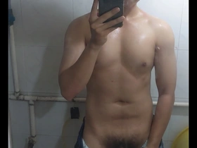 A young Japanese man’s big cock brings an orgasm