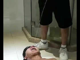 Gay toilet scene with piss and spit fetish