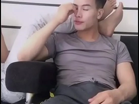 Gay Asian man masturbates on live webcam.
