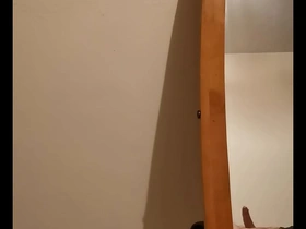 A chubby gay guy masturbates in front of a hidden camera.