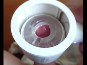 Japanese gay masturbates with a sex toy and ejaculates.