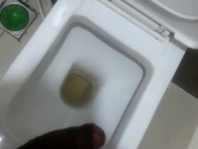 Hot Indian gay masturbates in office bathroom