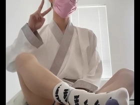 Kneeling Asian sissy boy in hanfu gets a facial