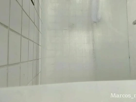 A solo boy enjoys a sensual bath in a rather dirty hotel bathroom.