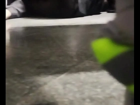 A man who has just come back from a trip goes to the bathroom and gives a blow job to another man who is still attending to him.
