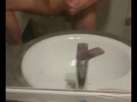 Young gay man pleasuring himself