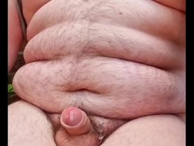 Chubby gay man masturbates quickly outside