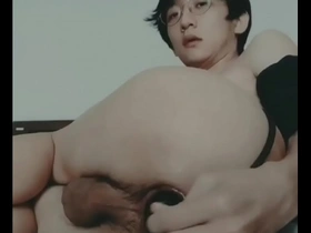 Young Asian man shows off his stretched hole and prolapse