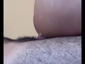 Gay men with body hair have rough anal sex without a condom.