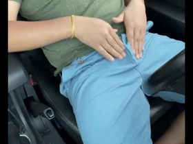 Young guy pleasuring himself in the car