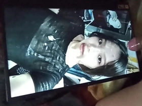 Asian beauty gets a facial with cumtribute