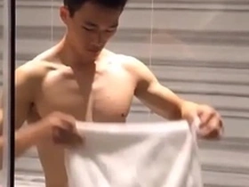 Steamy scene of a fit hunk washing his cock in Taiwan