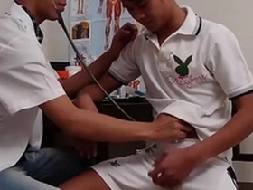 Twink gets fucked in the ass with a toy while being urinated on.