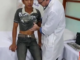 Young Asian boy gets it hard in the doctors room with an older pervert.