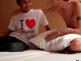 Two young men of Asian and Arab descent give each other pleasure