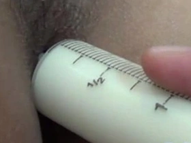 Young Asian boy enjoys enema in uniform