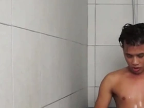 Asian twink enjoys a solo shower with masturbation.