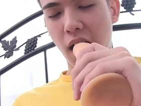 Xander is a skinny brunette boy who likes to pleasure himself with a dildo and masturbates to orgasm.