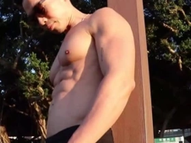 Public display of muscle worship with an Asian hunk
